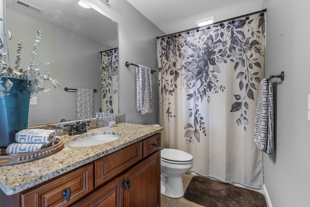 full bath featuring vanity, tile patterned flooring, toilet, and visible vents
