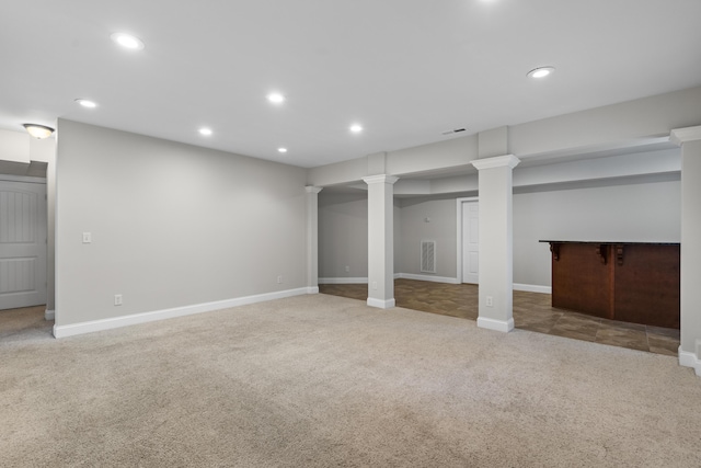 below grade area with visible vents, carpet flooring, and recessed lighting
