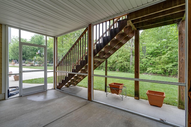 doorway to outside with concrete floors