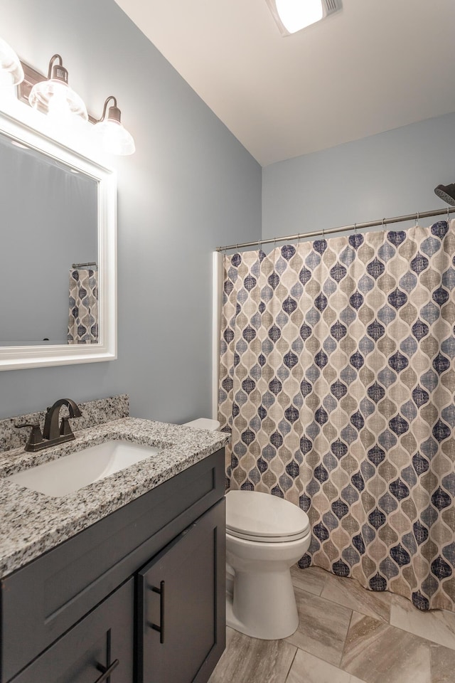485 Woodland Dr, Jasper, TN 37347 - bathroom featuring toilet, curtained shower, and vanity