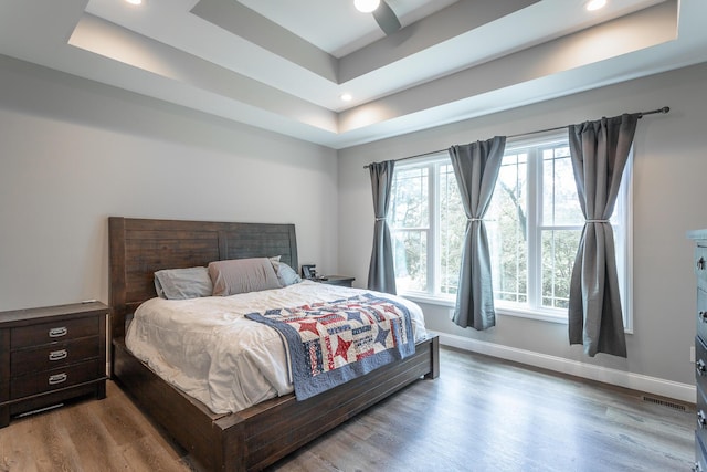 485 Woodland Dr, Jasper, TN 37347 - bedroom featuring a raised ceiling, recessed lighting, baseboards, wood finished floors, and visible vents