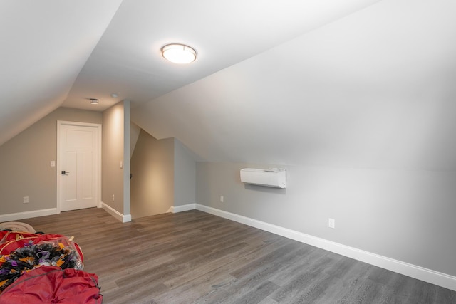 485 Woodland Dr, Jasper, TN 37347 - additional living space featuring baseboards, vaulted ceiling, and wood finished floors
