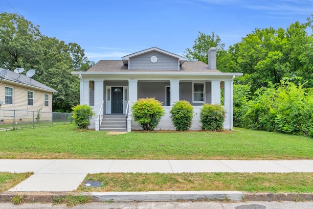 2211 Kirby Ave, Chattanooga, TN 37404 - bungalow-style home with a chimney, covered porch, and a shingled roof
