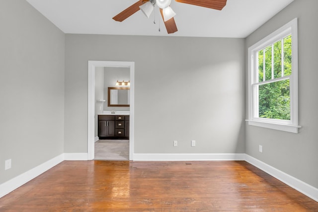 2211 Kirby Ave, Chattanooga, TN 37404 - empty room with a ceiling fan and wood finished floors