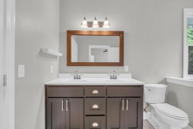 2211 Kirby Ave, Chattanooga, TN 37404 - bathroom with double vanity and toilet
