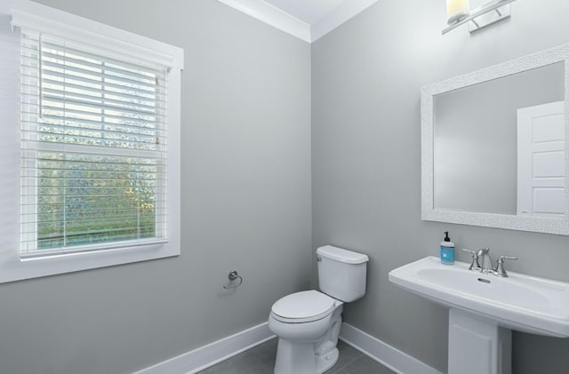 8520 Winter Refuge Way, Ooltewah, TN 37363 - bathroom featuring baseboards, tile patterned floors, a healthy amount of sunlight, and toilet