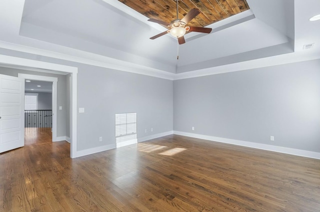 8520 Winter Refuge Way, Ooltewah, TN 37363 - unfurnished room with a raised ceiling, ceiling fan, visible vents, baseboards, and wood finished floors