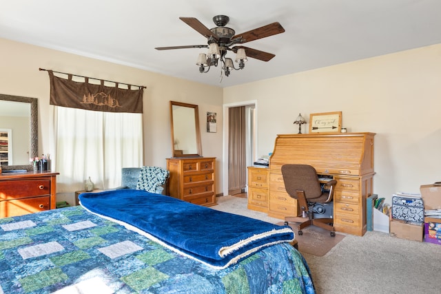 carpeted bedroom with a ceiling fan