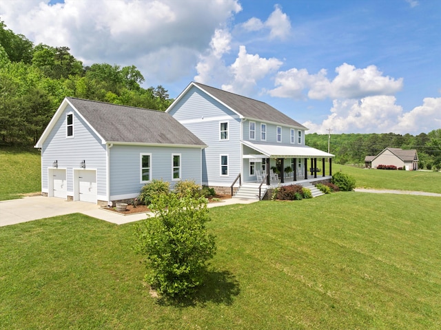 13111 Jones Gap Rd, Soddy Daisy, TN 37379 - view of front facade with a porch, concrete driveway, a front yard, and a shingled roof