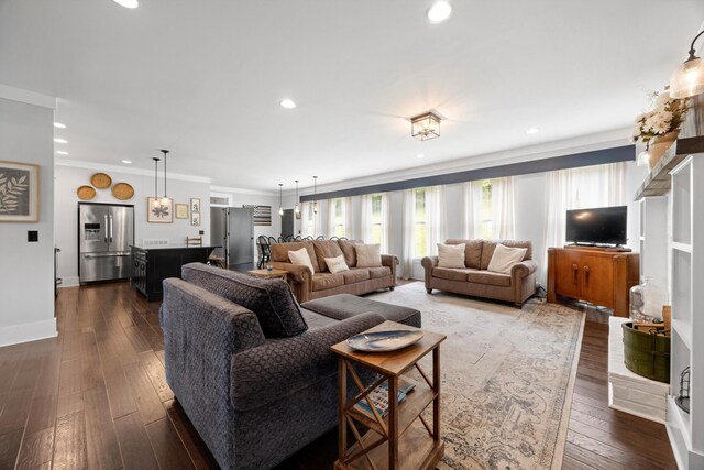 13111 Jones Gap Rd, Soddy Daisy, TN 37379 - living area featuring dark wood-type flooring, ornamental molding, and recessed lighting