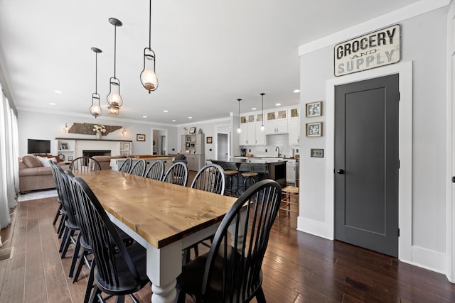 13111 Jones Gap Rd, Soddy Daisy, TN 37379 - dining room featuring dark wood-type flooring, recessed lighting, and ornamental molding