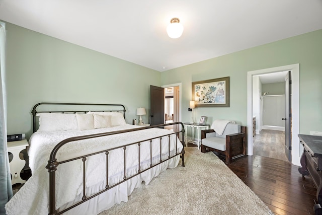 13111 Jones Gap Rd, Soddy Daisy, TN 37379 - bedroom with wood-type flooring and baseboards