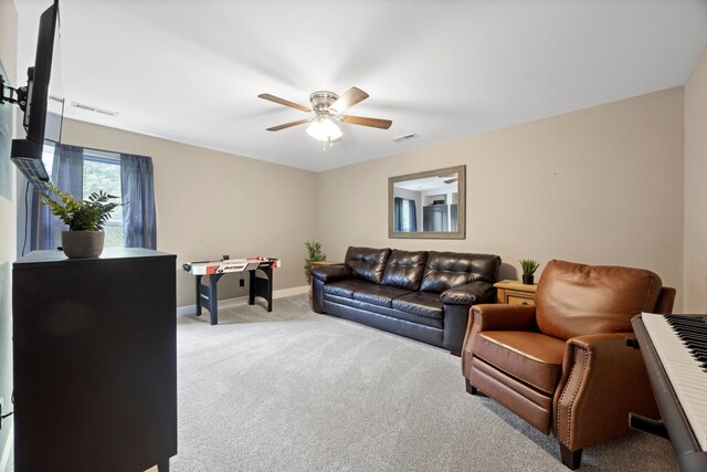 13111 Jones Gap Rd, Soddy Daisy, TN 37379 - living area with light colored carpet and a ceiling fan