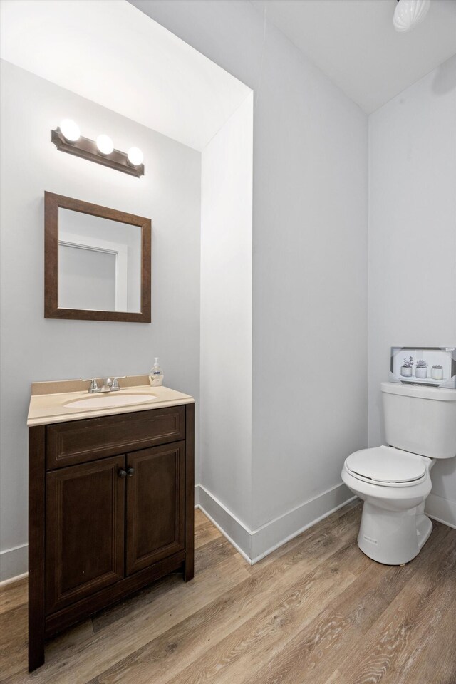 13111 Jones Gap Rd, Soddy Daisy, TN 37379 - half bath featuring wood finished floors and vanity