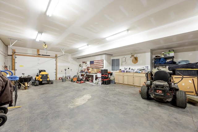 13111 Jones Gap Rd, Soddy Daisy, TN 37379 - garage featuring a workshop area and electric panel