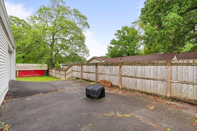 view of yard with a fenced backyard and a patio