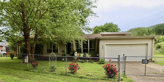 3421 Franklin Dr, Chattanooga, TN 37419 - ranch-style home with concrete driveway and an attached garage