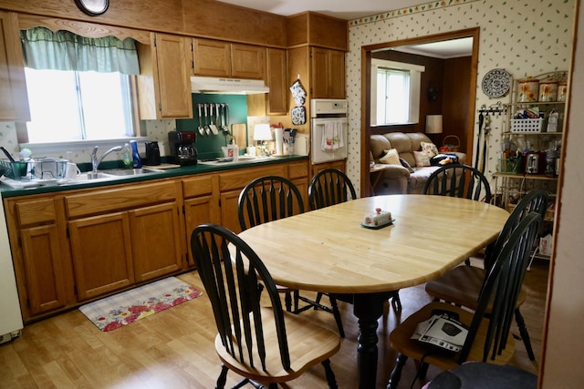 3421 Franklin Dr, Chattanooga, TN 37419 - dining space featuring wallpapered walls and light wood-type flooring
