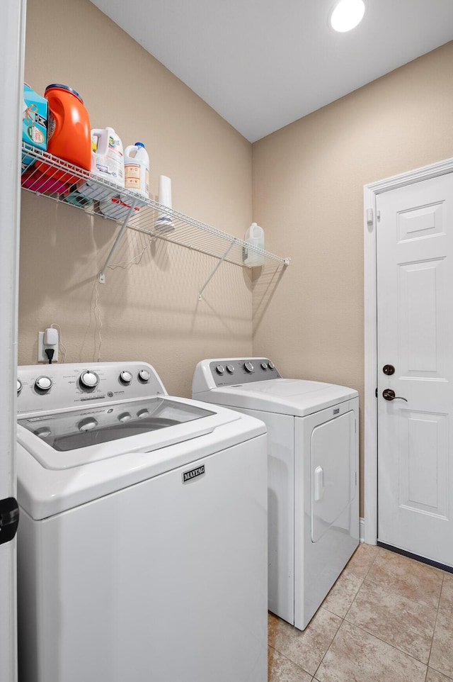 745 Soaring Eagle Cir, Hixson, TN 37343 - laundry area featuring independent washer and dryer, laundry area, and light tile patterned floors