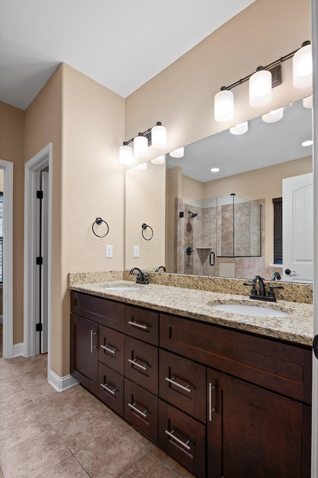 745 Soaring Eagle Cir, Hixson, TN 37343 - bathroom with double vanity, a sink, a stall shower, and tile patterned floors
