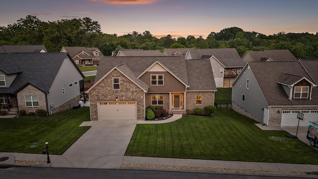 745 Soaring Eagle Cir, Hixson, TN 37343 - craftsman-style house featuring a garage, a yard, driveway, and stone siding