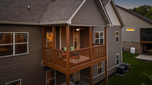 745 Soaring Eagle Cir, Hixson, TN 37343 - rear view of property with a lawn, central AC, and roof with shingles