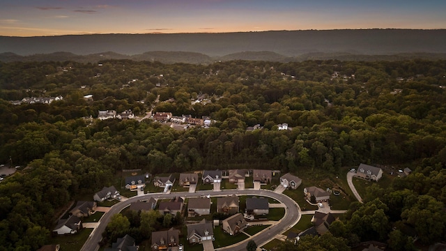 745 Soaring Eagle Cir, Hixson, TN 37343 - aerial view at dusk with a wooded view