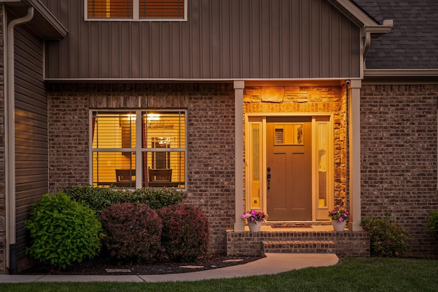 745 Soaring Eagle Cir, Hixson, TN 37343 - view of exterior entry with board and batten siding and brick siding