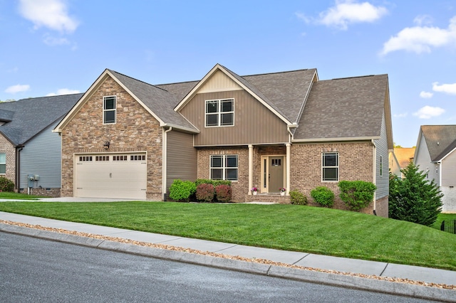 745 Soaring Eagle Cir, Hixson, TN 37343 - craftsman-style house featuring a front lawn, roof with shingles, brick siding, an attached garage, and driveway