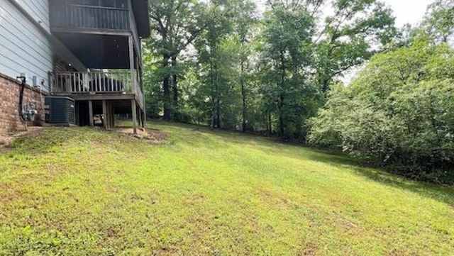 view of yard with central AC