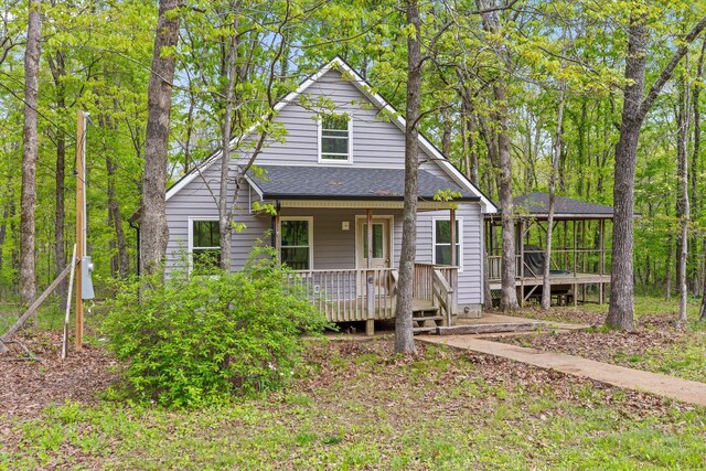 6475 Polly Ln, Signal Mountain, TN 37377 - view of front facade with a shingled roof, covered porch, and a deck