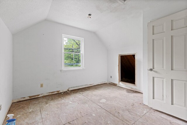 6475 Polly Ln, Signal Mountain, TN 37377 - bonus room featuring lofted ceiling and a textured ceiling