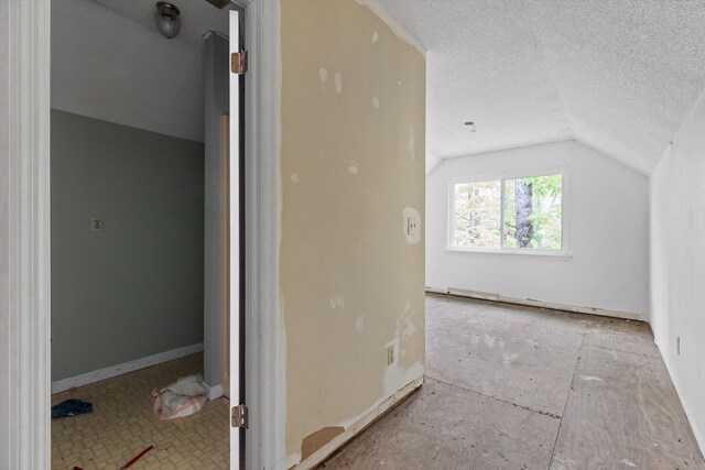 6475 Polly Ln, Signal Mountain, TN 37377 - bonus room featuring vaulted ceiling and a textured ceiling