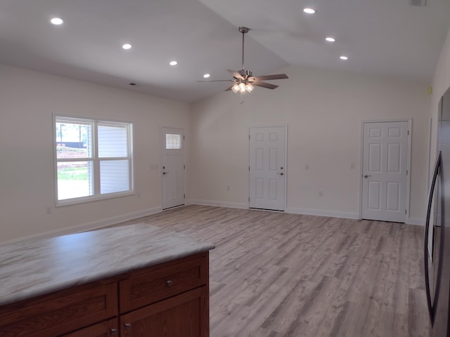 unfurnished living room with a ceiling fan, high vaulted ceiling, recessed lighting, and light wood-style floors