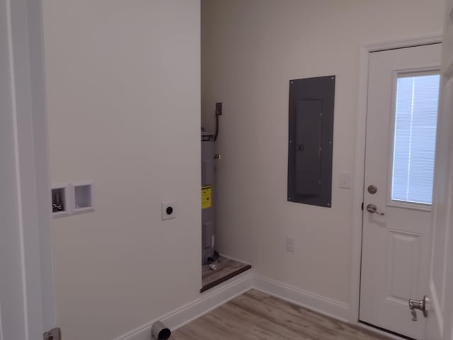 laundry room featuring hookup for an electric dryer, laundry area, electric panel, hookup for a washing machine, and light wood-style flooring