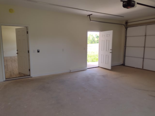garage featuring a garage door opener