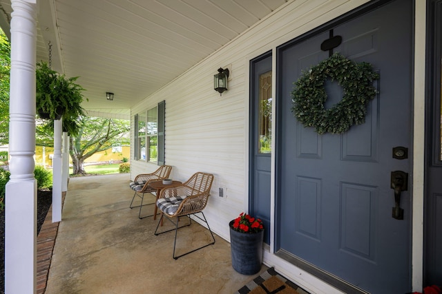 doorway to property with a porch