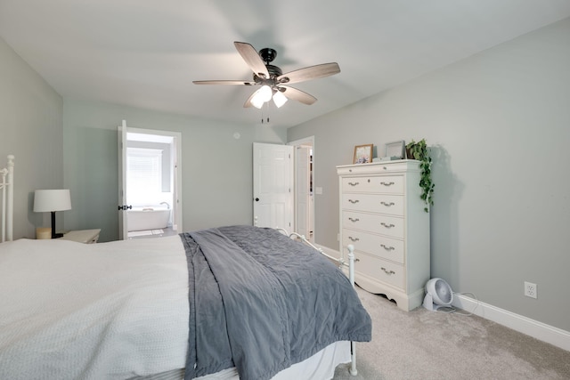 bedroom featuring baseboards, ceiling fan, and light colored carpet