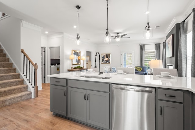 8418 Snowdrop Way, Ooltewah, TN 37363 - kitchen featuring stainless steel dishwasher, gray cabinetry, a sink, and crown molding
