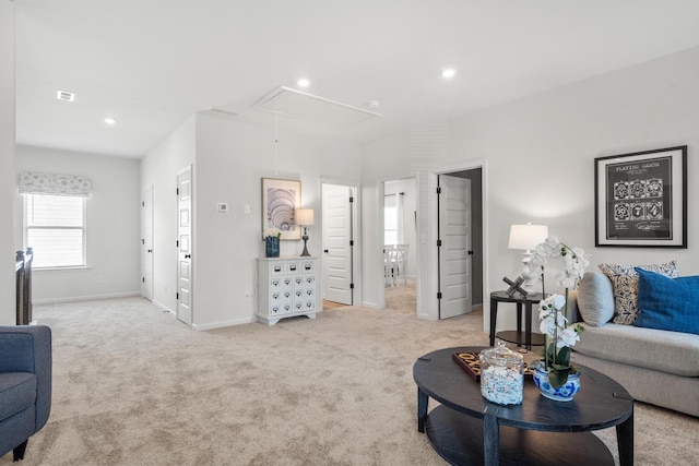 8418 Snowdrop Way, Ooltewah, TN 37363 - living room featuring attic access, baseboards, recessed lighting, and light carpet