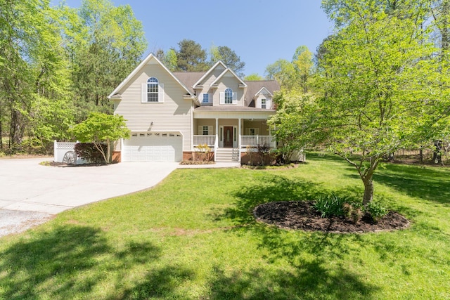 traditional-style home featuring a garage, a porch, a front lawn, and concrete driveway