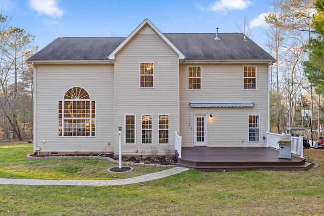 back of house with a lawn and a wooden deck
