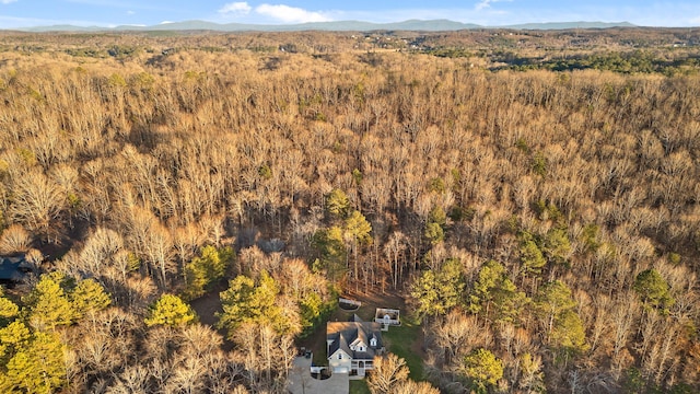 aerial view featuring a mountain view and a forest view