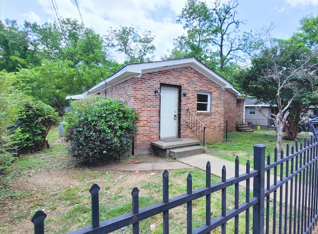 exterior space with a fenced front yard