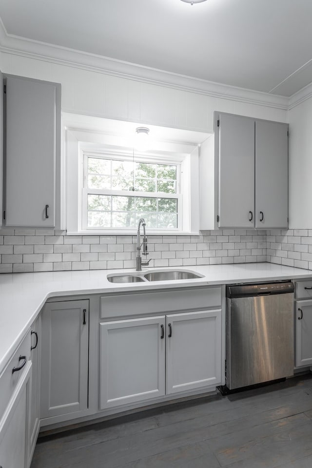 504 1st St, Lafayette, GA 30728 - kitchen with stainless steel dishwasher, a sink, crown molding, backsplash, and light countertops