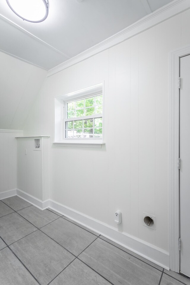504 1st St, Lafayette, GA 30728 - bonus room with baseboards, vaulted ceiling, and tile patterned floors