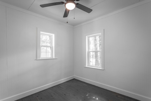 504 1st St, Lafayette, GA 30728 - unfurnished room featuring dark wood finished floors, healthy amount of natural light, baseboards, a ceiling fan, and crown molding