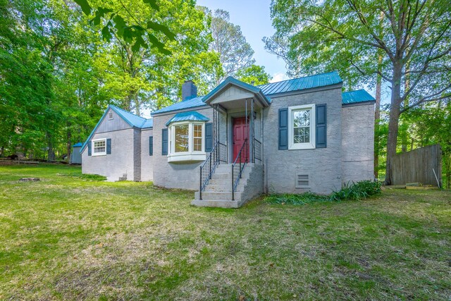 504 1st St, Lafayette, GA 30728 - view of front of home with a chimney, metal roof, and a standing seam roof