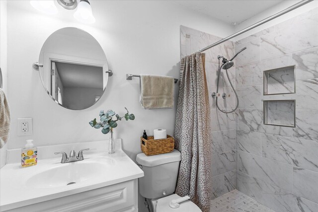 3818 Granada Dr, Chattanooga, TN 37411 - full bath with toilet, a tile shower, and vanity