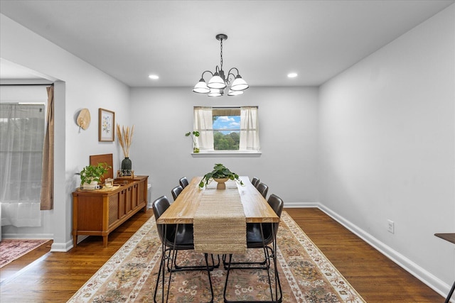 3818 Granada Dr, Chattanooga, TN 37411 - dining room with a chandelier, dark wood-style floors, baseboards, and recessed lighting